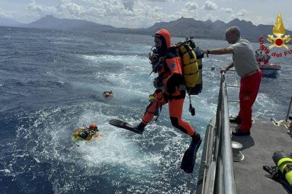 Divers search for the missing after the yacht sank on August 19, 2024.