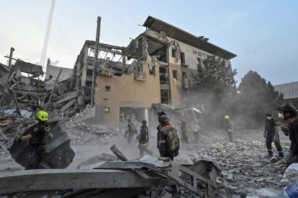 Rescuers work at a site of a Russian missile strike, amid Russia's attack on Ukraine, in Kryvyi Rih, Ukraine on August 27, 2024. REUTERS/Stringer