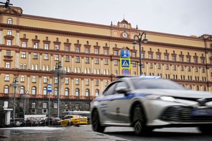 A police car goes past the headquarters of the Federal Security Service (FSB) and Lubyanka Square in front of it in central Moscow on March 3.