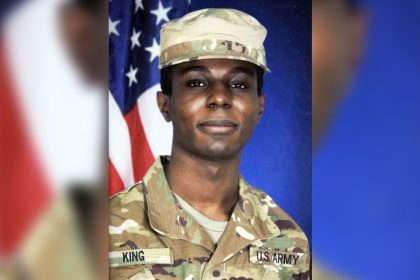 This family photo shows a portrait of American soldier Travis King displayed at the home of his grandfather Carl Gates, Wednesday, July 19, 2023, in Kenosha, Wis. Pvt. King bolted into North Korea while on a tour of the Demilitarized Zone on Tuesday, July 18, a day after he was supposed to travel to a base in the U.S. (Family Photo via AP)