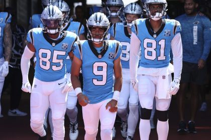 Bryce Young leads the Carolina Panthers out for preseason action.