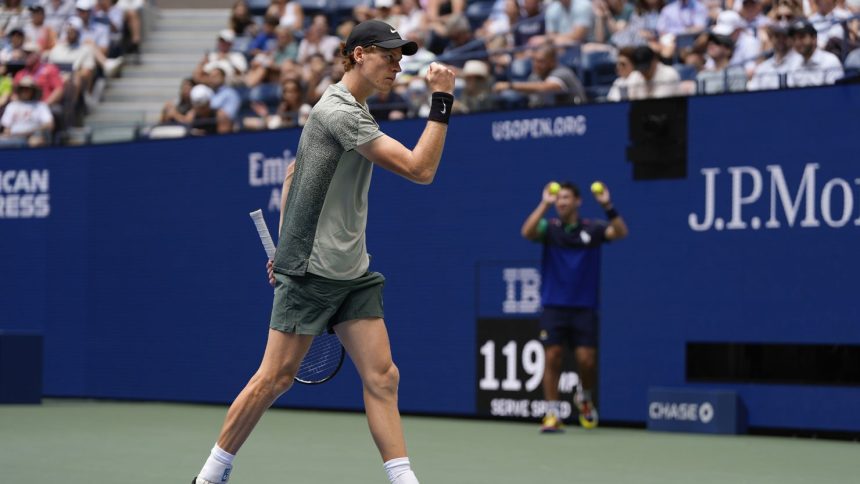 Jannik Sinner celebrates winning against Alex Michelsen at the US Open.