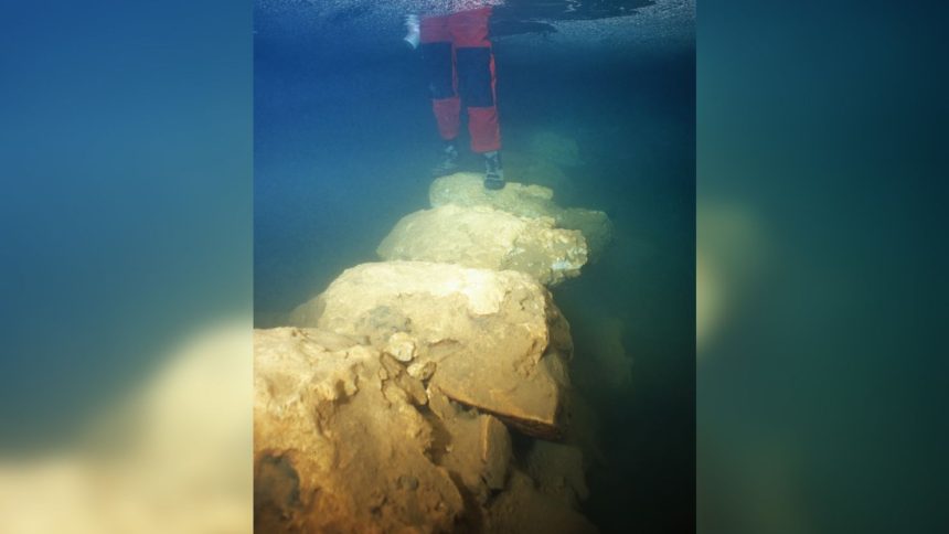 A new analysis of a submerged bridge inside Genovesa Cave reveals humans lived on the Spanish island of Mallorca in the Mediterranean Sea much earlier than believed. Here's a close-up view of the stone bridge.