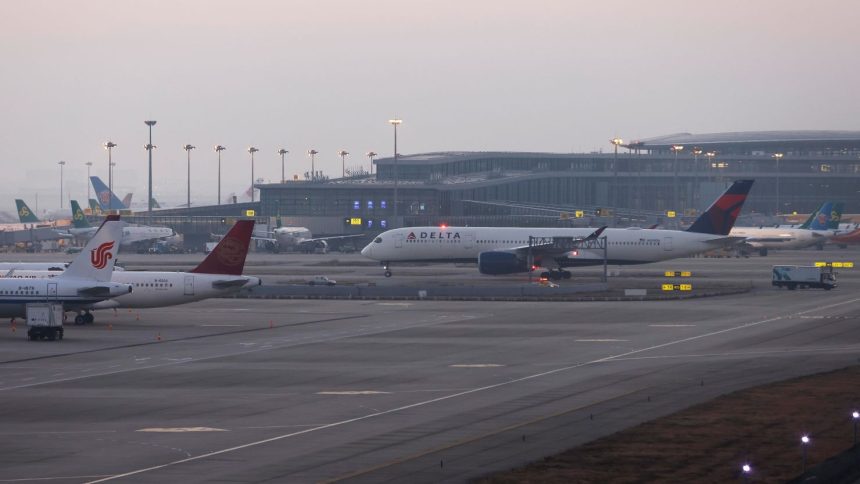 A Delta Airlines flight arrives at Shanghai Pudong International Airport on January 8, 2023 in Shanghai, China.