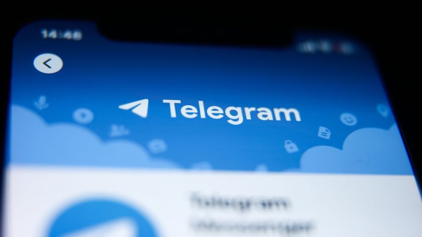 Telegram icon displayed on a phone screen is seen in this illustration photo taken in Krakow, Poland on September 26, 2023.