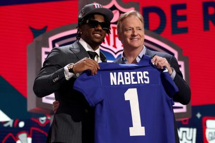 Nabers poses with NFL Commissioner Roger Goodell after being selected sixth overall by the New York Giants.