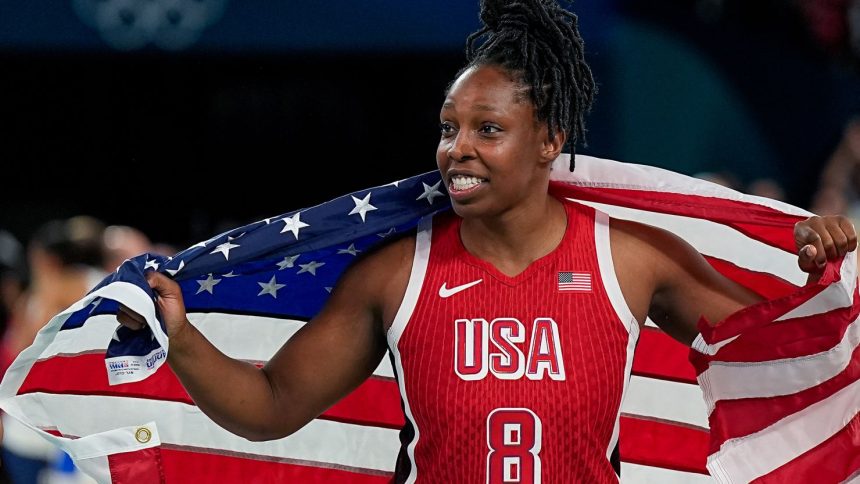 PARIS, FRANCE - AUGUST 11: Chelsea Gray of United States celebrates their victory of the gold medal at the final whistle during the Women's Gold Medal Game, Game 52, France vs United States of America on day sixteen of the Olympic Games Paris 2024 at Arena Bercy on August 11, 2024 in Paris, France. (Photo by Daniela Porcelli/Eurasia Sport Images/Getty Images)