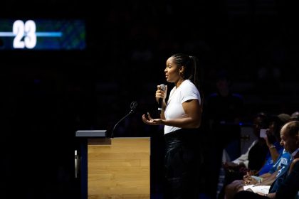 Former Minnesota Lynx player Maya Moore speaks during a jersey retirement ceremony after the game between the Minnesota Lynx and Indiana Fever at Target Center in Minneapolis, Minnesota on August 24, 2024.