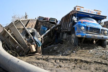 Damaged trucks buried in the mud after the collapse of the Arbaat Dam, 40km north of Port Sudan following heavy rains and torrential floods on August 25, 2024.