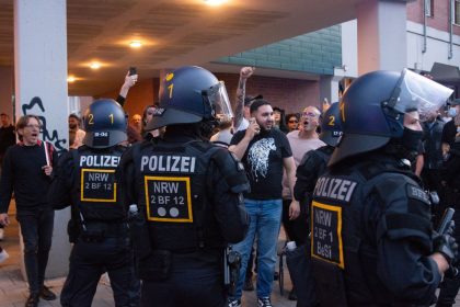 Police block counter-demonstrators as right-wing extremist groups protest against government immigration policy in Solingen, Germany, on August 26.