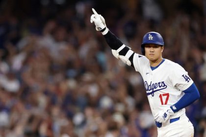 Shohei Ohtani of the Los Angeles Dodgers celebrates after hitting a walk-off grand slam home run, his 40th home run of the season.