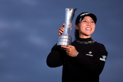 ST ANDREWS, SCOTLAND - AUGUST 25: Champion, Lydia Ko of New Zealand poses with the AIG Women's Open trophy following victory on Day Four of the AIG Women's Open at St Andrews Old Course on August 25, 2024 in St Andrews, Scotland. (Photo by Morgan Harlow/R&A/R&A via Getty Images)