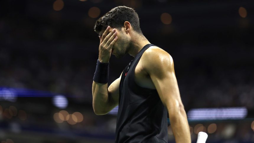 Carlos Alcaraz of Spain reacts after a point against Botic van de Zandschulp of the Netherlands during their match on day four of the 2024 US Open in Flushing, New York, on August 29, 2024.