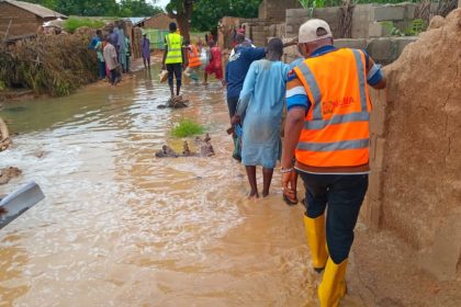 Nigerian emergency management agency officials visit a flood-ravaged area in northern Jigawa State.