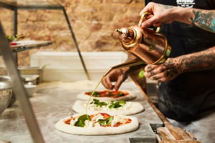 The olive oil – and the praise – flows Una Pizza Napoletana in New York City.