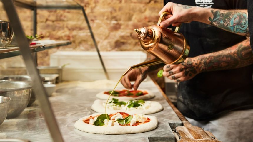 The olive oil – and the praise – flows Una Pizza Napoletana in New York City.