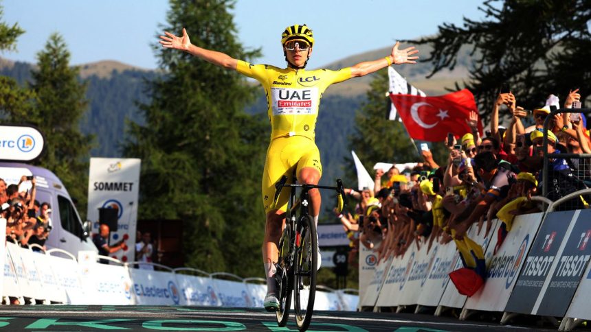 Tadej Pogačar celebrates winning stage 20 of this year's Tour de France.