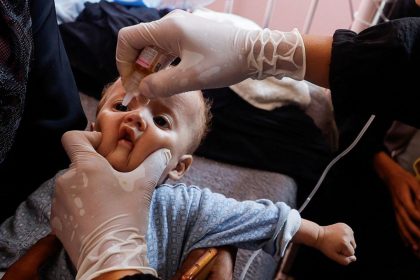 A Palestinian child is vaccinated against polio, amid the Israel-Hamas conflict, at Nasser hospital in Khan Younis in the southern Gaza Strip, August 31, 2024.