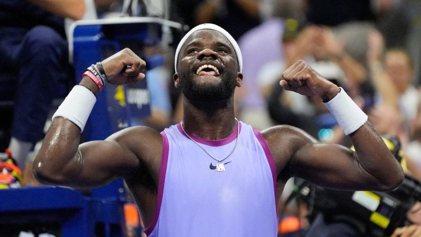 Frances Tiafoe celebrates after beating Alexei Popyrin in the fourth round of the US Open.