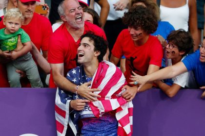 Ezra Frech of the United States celebrates after -- unexpectedly -- winning gold in the T63 100m.