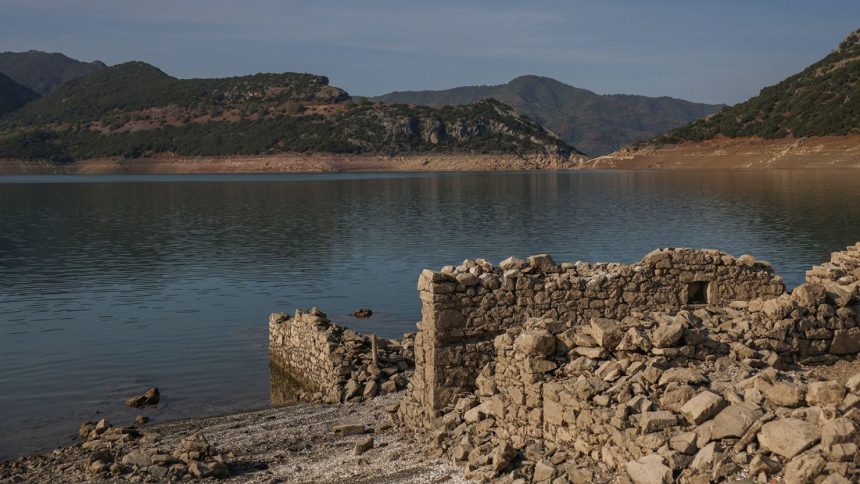 A sunken Greek village is reemerging from a lake as water levels dwindle due to a drought.