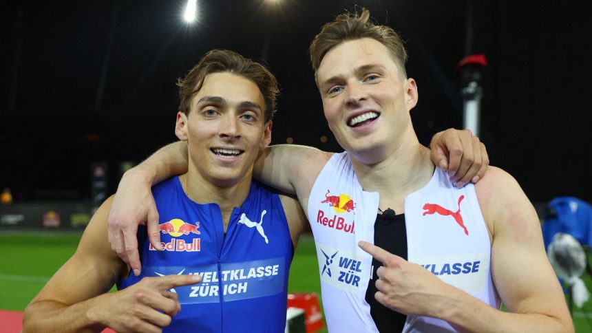 Sweden's Armand Duplantis and Norway's Karsten Warholm after their 100m exhibition race.