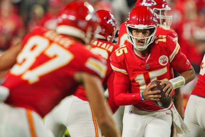 Kansas City Chiefs quarterback Patrick Mahomes scrambles during the first half against the Baltimore Ravens.