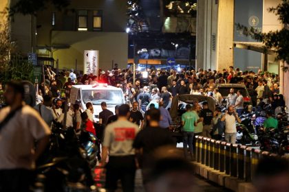 People gather outside American University of Beirut Medical Center in Beirut, Lebanon September 17, 2024.