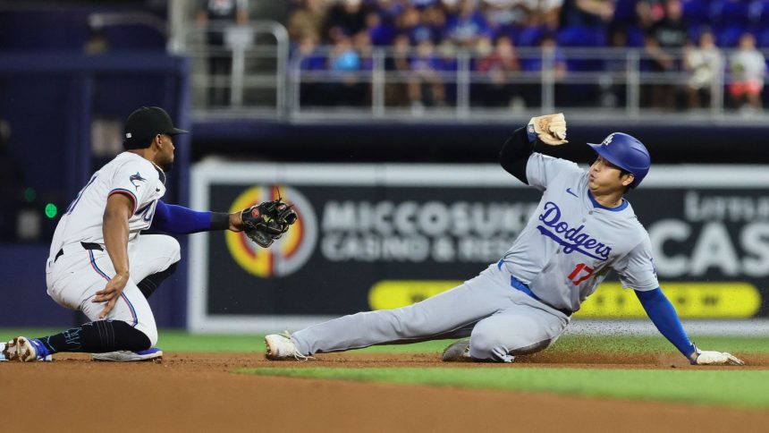 Los Angeles Dodgers star Shohei Ohtani steals second base against the Miami Marlins during the first inning at loanDepot Park.