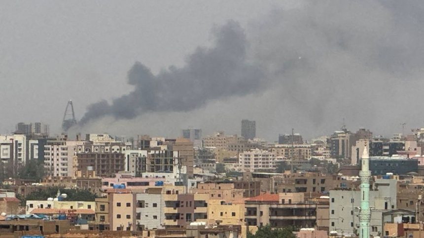 Plumes of smoke rise from Khartoum, Sudan on Thursday.