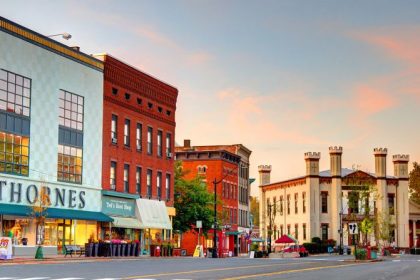 Northampton, Massachusetts, USA - October 15, 2020: Morning view of shops and City Hall along Main St in the downtown district