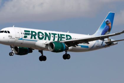 A Frontier Airlines plane files on February 15, 2022.