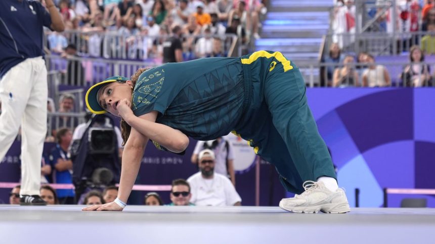 Australia's Rachael Gunn, known as B-Girl Raygun, competes during the Round Robin Battle at the breaking competition at La Concorde Urban Park at the 2024 Summer Olympics, Friday, Aug. 9, 2024, in Paris, France. (AP Photo/Frank Franklin)