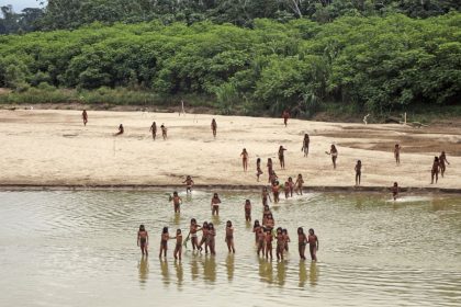 This June 2024 photo shows members of the Mashco Piro along Las Piedras River in the Amazon near the community of Monte Salvado, in Madre de Dios province, Peru.