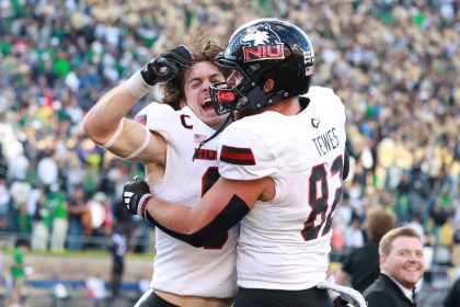 Northern Illinois Huskies tight ends Grayson Barnes (81) and Tristen Tewes (82) celebrate their victory against the Notre Dame Fighting Irish.