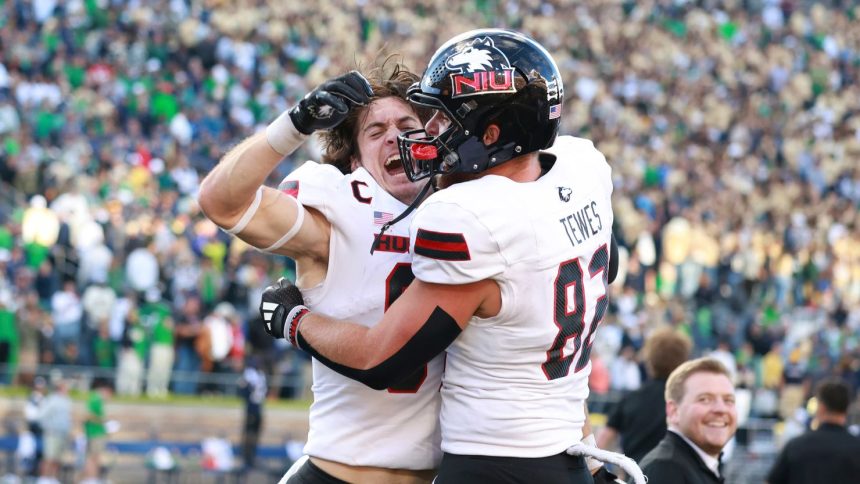 Northern Illinois Huskies tight ends Grayson Barnes (81) and Tristen Tewes (82) celebrate their victory against the Notre Dame Fighting Irish.