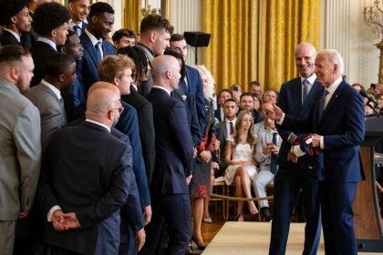 President Joe Biden and University of Connecticut men's basketball head coach Dan Hurley have fun at an event celebrating the Huskies' 2023-2024 NCAA championship.