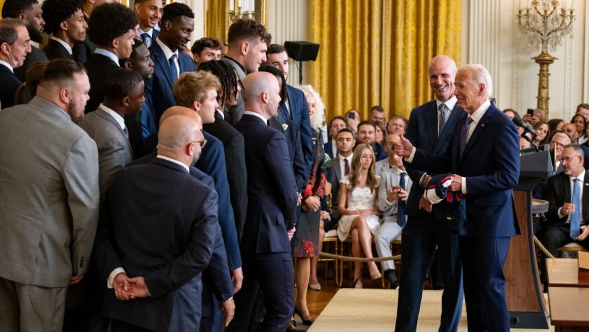 President Joe Biden and University of Connecticut men's basketball head coach Dan Hurley have fun at an event celebrating the Huskies' 2023-2024 NCAA championship.