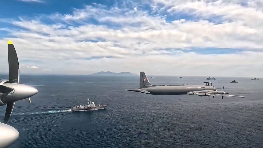 Russian anti-submarine aircraft fly during joint naval and air drills with China at the Ocean-2024 drills.