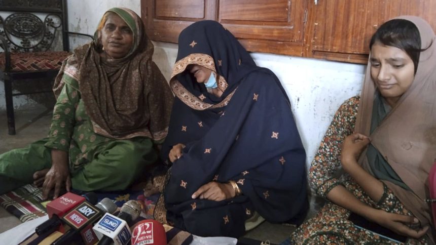 Family of Shah Nawaz — mother Rehmat Kunbhar (left), wife Niamat Bibi (center) and daughter Hareem Nawaz (right) — speak to media at their residence in Umerkot, a district in Pakistan's Sindh province, on September 21.