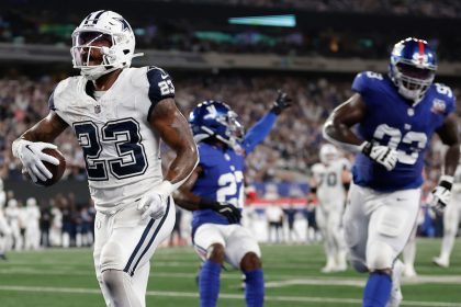 Dallas Cowboys running back Rico Dowdle celebrates scoring a touchdown against the New York Giants.