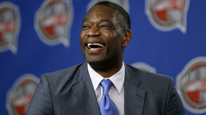 FILE - Former NBA basketball player Dikembe Mutombo laughs during a news conference announcing him as one of the 12 finalists of this year's hall of fame class during an event ahead of the NBA All Star basketball game, on Feb. 14, 2015, in New York. (AP Photo/Julio Cortez, File)