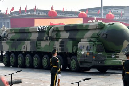 Military vehicles carrying DF-41 intercontinental ballistic missiles roll during a parade to celebrate the 70th anniversary of the founding of the People's Republic of China on October 1, 2019 in Beijing.