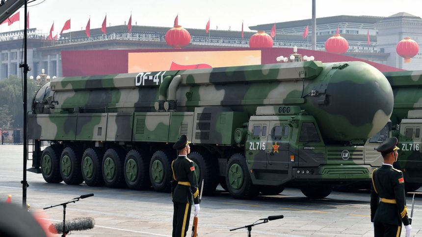 Military vehicles carrying DF-41 intercontinental ballistic missiles roll during a parade to celebrate the 70th anniversary of the founding of the People's Republic of China on October 1, 2019 in Beijing.