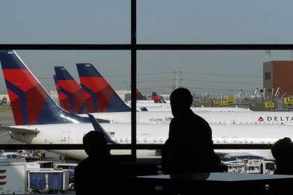 Delta Air Lines planes sit at gates at Salt Lake City International Airport in a 2020 file photo.