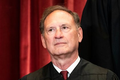 Associate Justice Samuel Alito sits during a group photo of the Justices at the Supreme Court in Washington, DC on April 23, 2021.