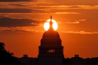 The sun rises directly east over the US Capitol dome just a few days before the 2022 fall equinox.