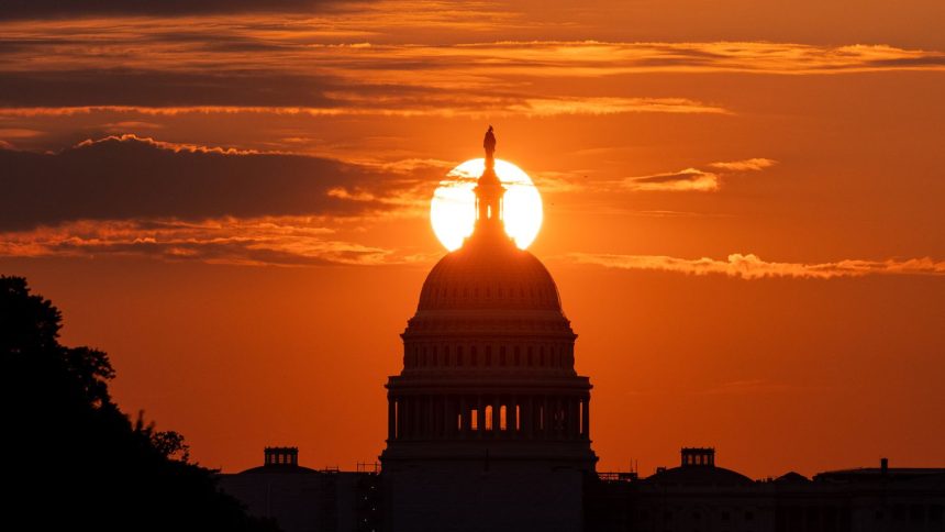 The sun rises directly east over the US Capitol dome just a few days before the 2022 fall equinox.