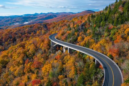 Hugging Grandfather Mountain in North Carolina, the Linn Cove Viaduct is a graceful stretch of road on the Blue Ridge Parkway, especially when the leaves are putting on their autumn show.