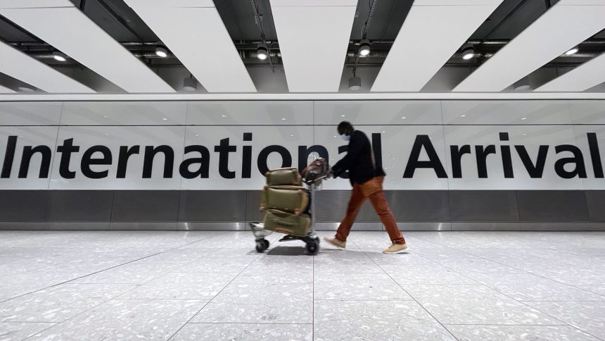 International passengers arriving at London's Heathrow Airport in 2021.